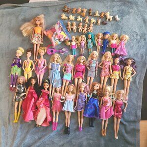 Large LOT of barbie dolls & accessories & more.